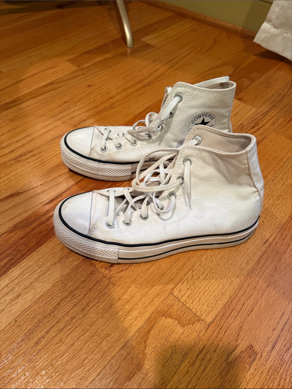White platform Converse high tops
